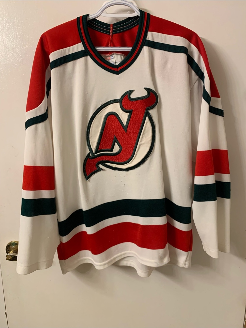 CCM Men's White and Red V-Neck New Jersey Devils Hockey Jersey